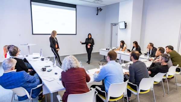 12 investor partners of Espace CDPQ at a presentation by the two founders of Omy Laboratoires, a fast-growing company in Québec city.